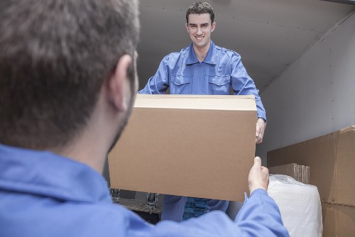 Professional movers handling furniture during a local Pentonville move